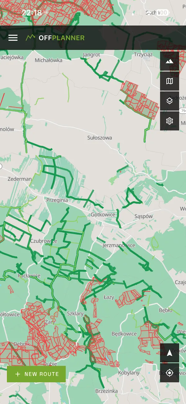 The app's route planner with known off-road tracks drawn over the map